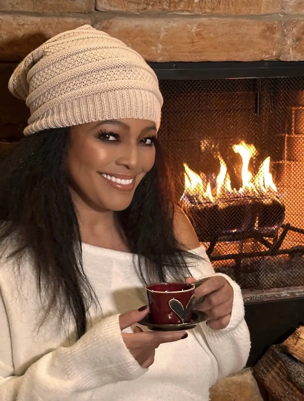 A warm cup by the fireplace at the Winter Edit